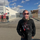 A protester in Spain wears a Jeff Bezos mask.